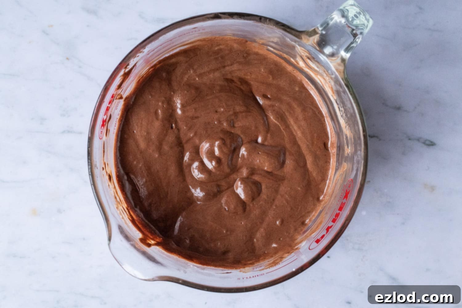 Divine Vegan Chocolate Mousse 4 step 3 - combining the chocolate and aquafaba for a light mousse
