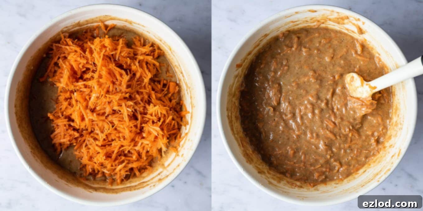 Spiced Vegan Carrot Cake with Tangy Cream Cheese 3 Step-by-step image showing grated carrots being gently folded into the vegan carrot cake batter.