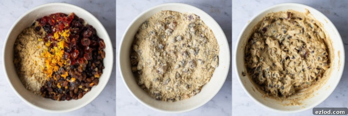 Plant-Powered Simnel 3 Step-by-step image showing the next stage of vegan Simnel cake batter preparation: dried fruits, citrus zest, and non-dairy milk are being added to the mixture and gently stirred to combine, forming a rich, fruity batter.