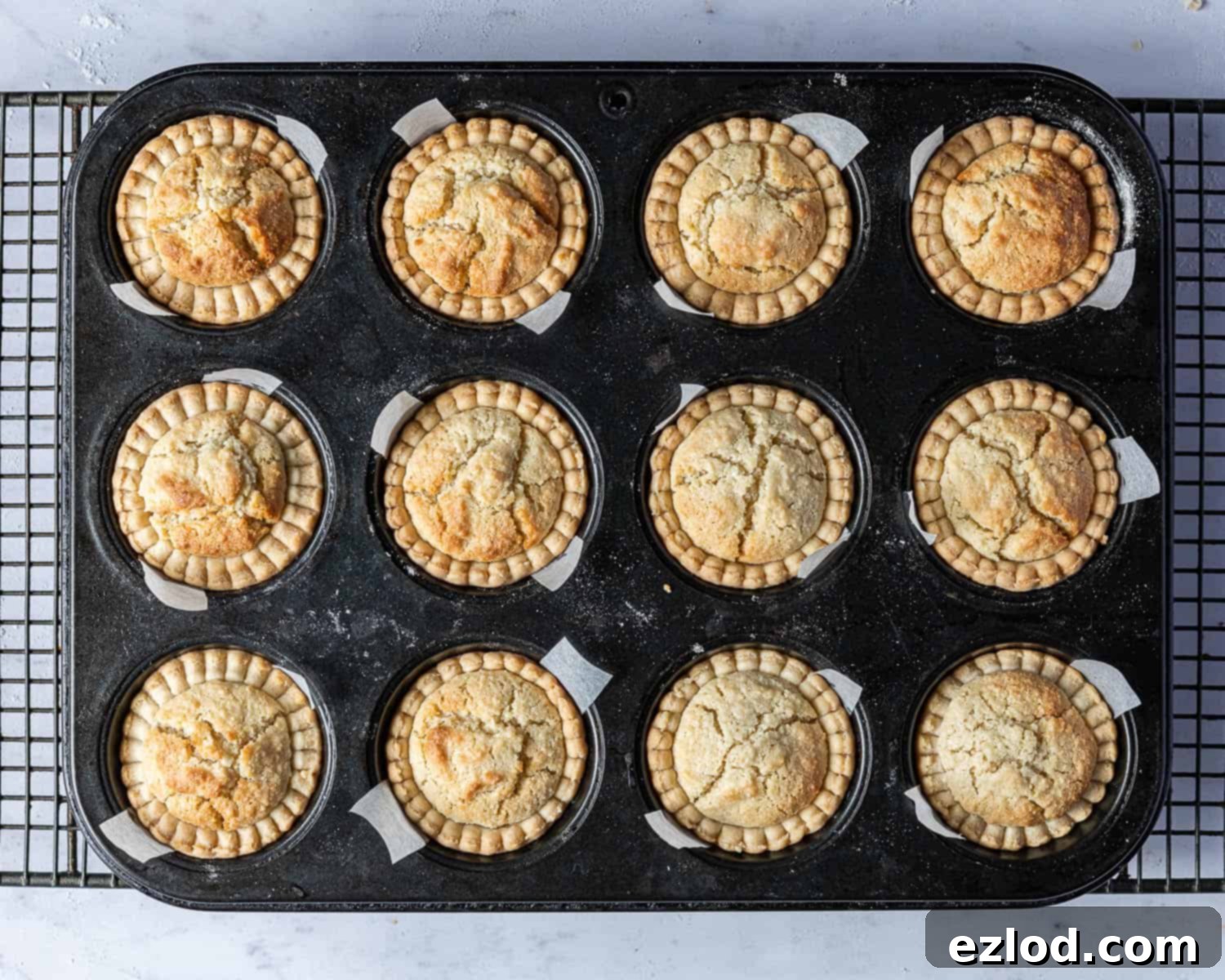 Irresistible Vegan Cherry Bakewells 9 The baked tarts in the muffin tin.