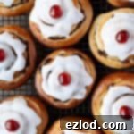 Plant-Based Belgian Delights 11 Vegan Belgian buns on a wire cooling rack.