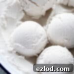 Effortless Vegan Coconut Ice Cream 8 Close up of scoops of easy coconut ice cream.