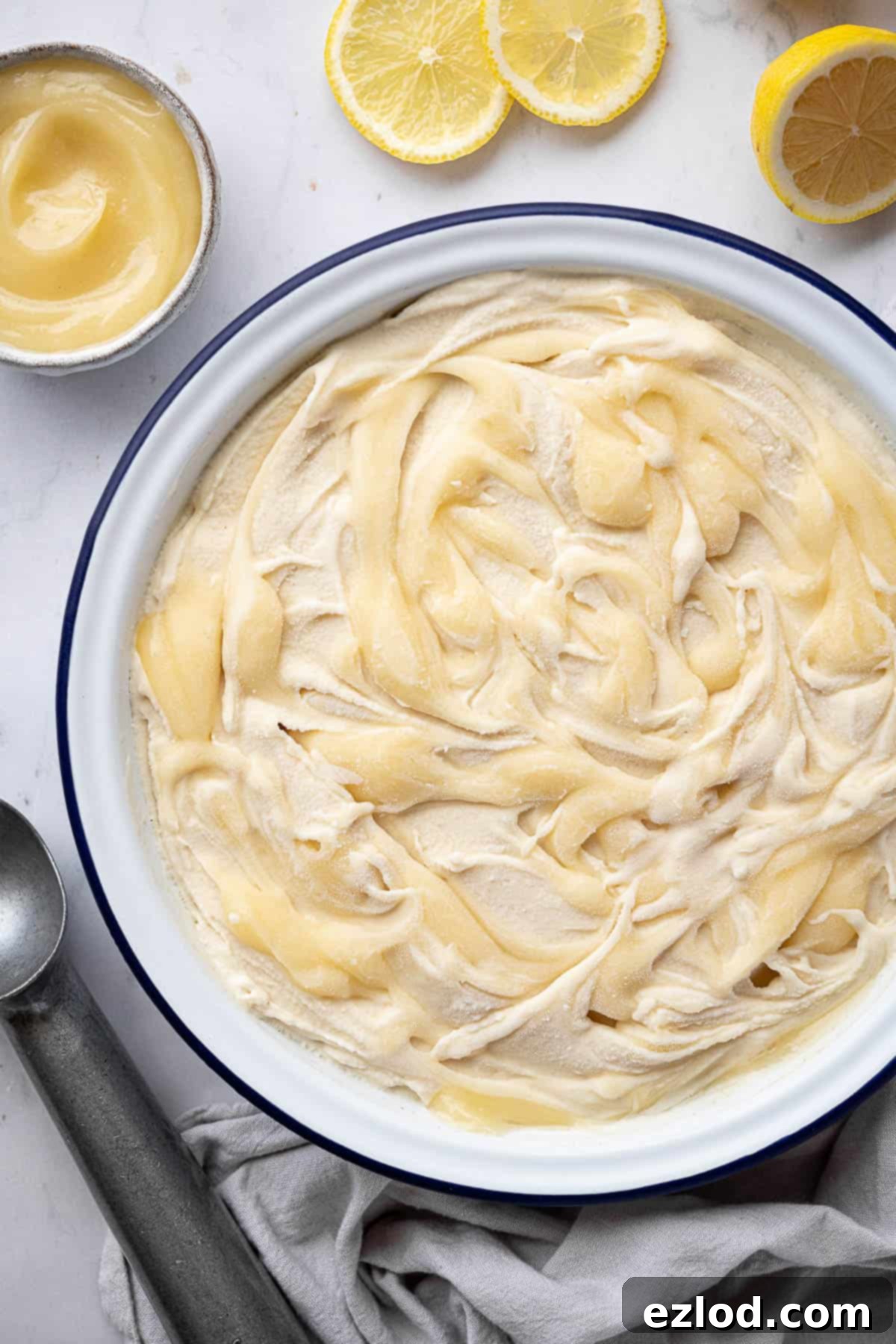 Refreshing Vegan Lemon Delight 9 A close-up of a rustic bowl filled with creamy vegan lemon ice cream, ready to be enjoyed, highlighting its smooth texture and refreshing appeal.