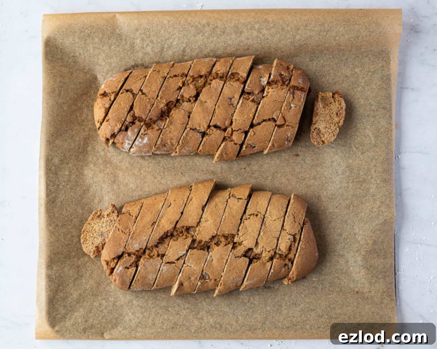 Warmly Spiced Vegan Gingerbread Biscotti 8 Step 5, the baked logs cut into slices.