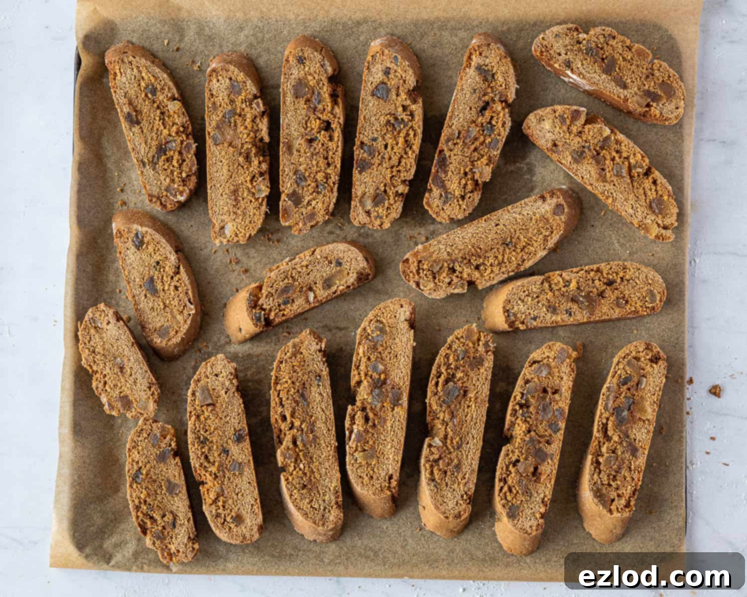 Warmly Spiced Vegan Gingerbread Biscotti 9 Step 6, the biscotti on a baking tray.