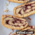 Luscious Vegan Jam Roly-Poly 16 Close up of slices of vegan jam roly-poly.