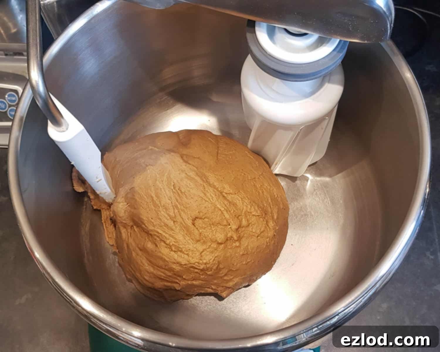 Jamaican Plant-Based Spiced Bun 7 Step 3: The dough after sufficient kneading, looking smooth, elastic, and pulling away from the sides of the bowl.