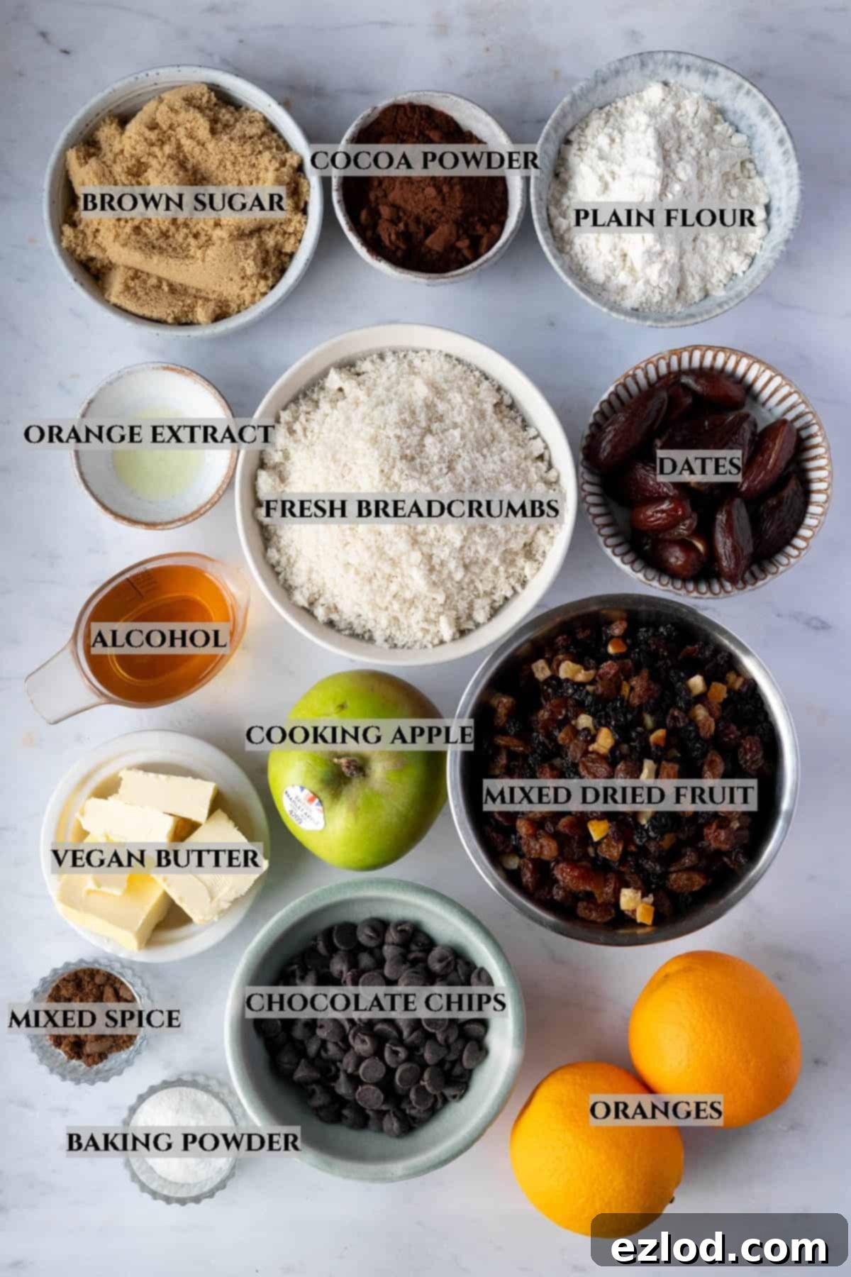 Guilt-Free Vegan Chocolate Christmas Pudding 3 A labelled photo of the ingredients needed to make vegan chocolate Christmas pudding in bowls.