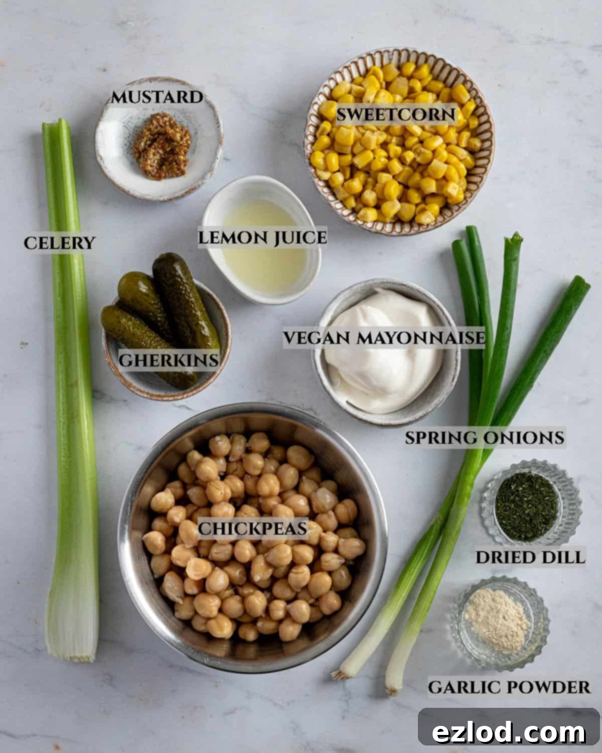 Creamy Chickpea Salad 3 A labelled photo of the essential ingredients needed to craft a perfect chickpea mayo salad, neatly arranged for preparation.