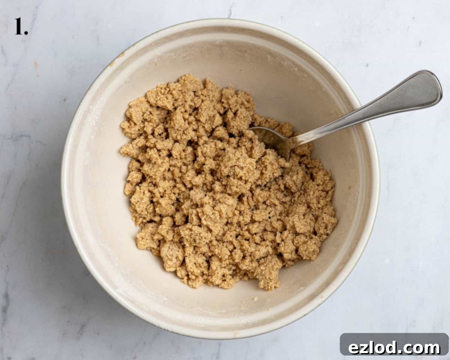 Plant-Based Streusel Cake 5 Step 1, the streusel topping in a bowl.