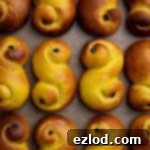 Plant-Based Saffron Buns for St. Lucia 17 Rows of vegan St. Lucia buns.