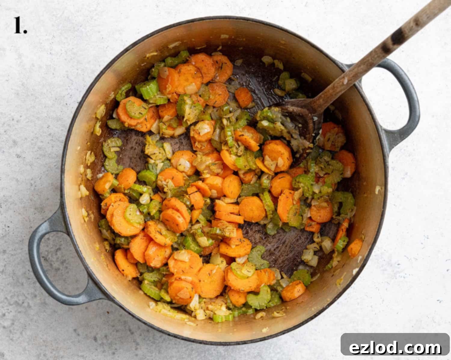 Plant-Based Chicken Noodle Soup 5 Step-by-step image showing the fried vegetables and seasonings simmering gently in a pan, forming the aromatic base for the soup.