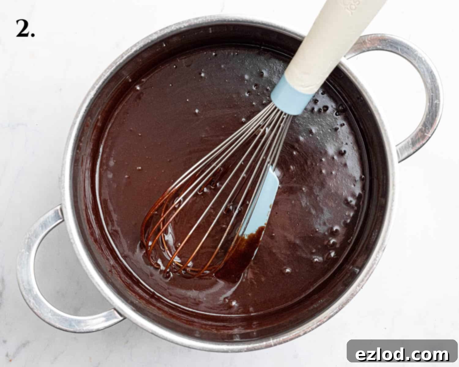 Vegan Chocolate Orange Fudge Brownies 6 Step 2, the melted chocolate mixture in a pan.