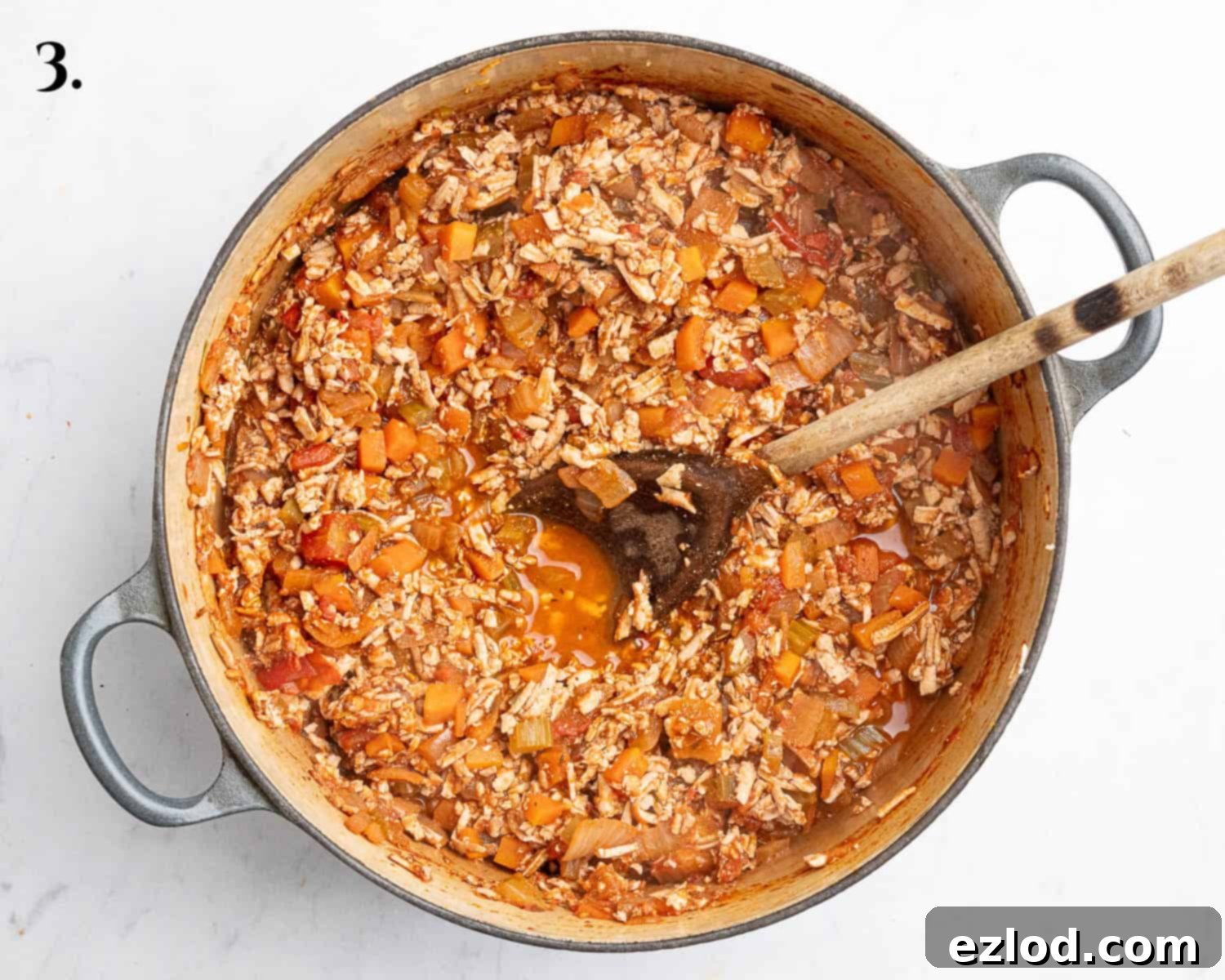 Gooey Vegan Gnocchi Bake 7 Step 3 in making cheesy vegan gnocchi bake: The rich, simmering tofu bolognese sauce in a pan, fully cooked and ready for assembly.