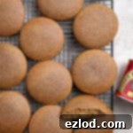 Plant-Based Jamaican Bulla Delight 11 Freshly baked vegan Jamaican bulla cakes cooling on a wire rack.