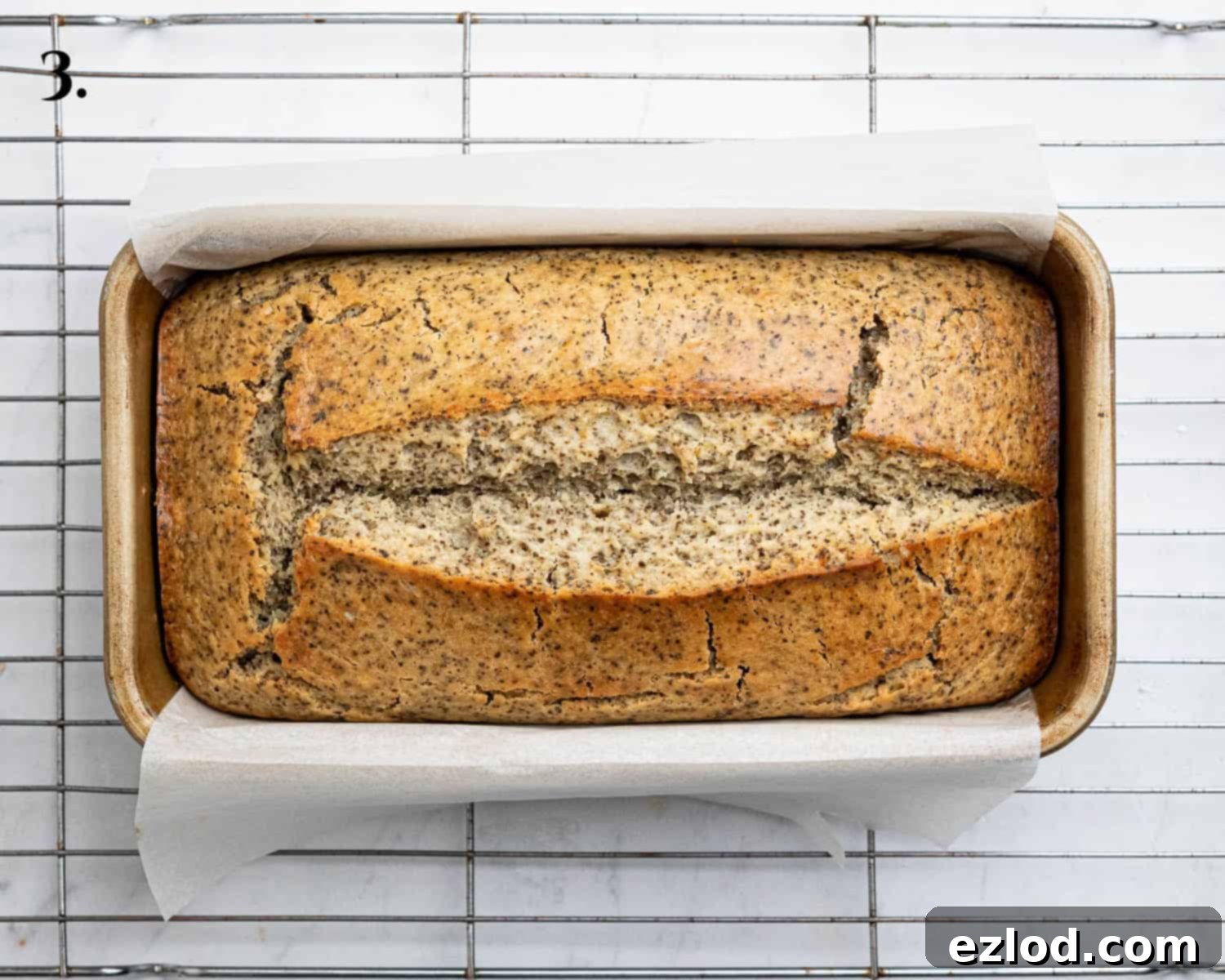 Zesty Vegan Earl Grey Lemon Cake 7 Step 3 in making vegan Earl Grey lemon cake: the finished batter is poured into a lined 2lb loaf tin, ready for baking in the oven until golden brown and cooked through.