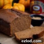 Vegan Pumpkin Gingerbread 11 Vegan pumpkin gingerbread with mini pumpkins and a tin of treacle.