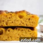 Autumn Spiced Vegan Pumpkin Focaccia 15 Close up of the pumpkin focaccia crumb.