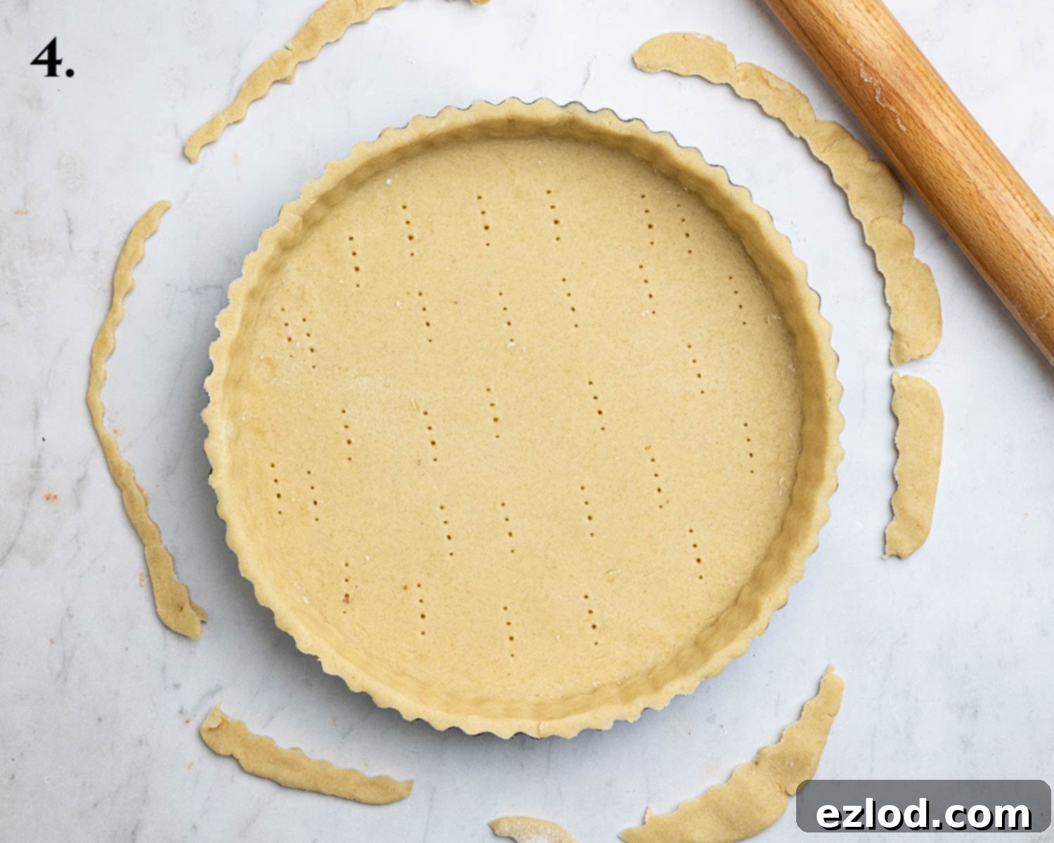 Gingered Pear & Almond Vegan Tart 8 Step 4: The rolled-out pastry neatly lining a tart tin, ready for blind baking.