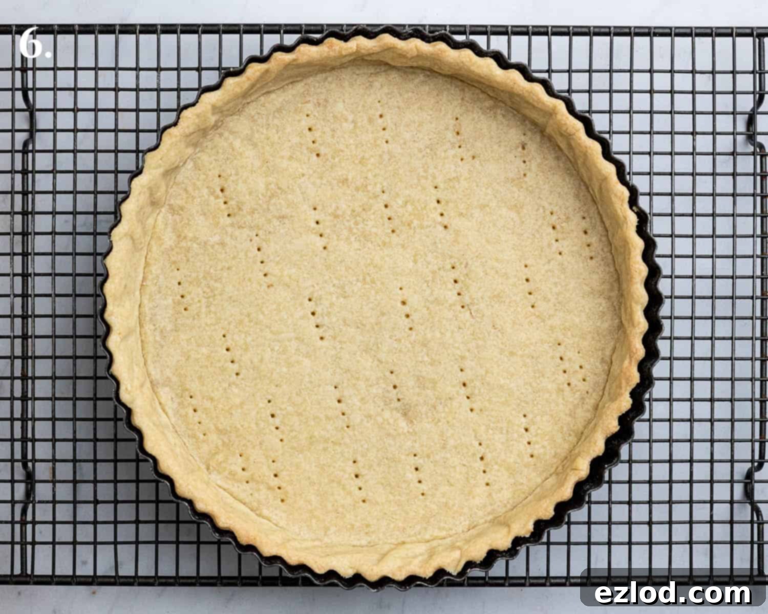 Gingered Pear & Almond Vegan Tart 10 Step 6: The blind-baked pastry case, lightly golden and ready for filling.