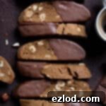 Plant-Based Coffee Hazelnut Biscotti 13 A row of vegan coffee hazelnut biscotti.