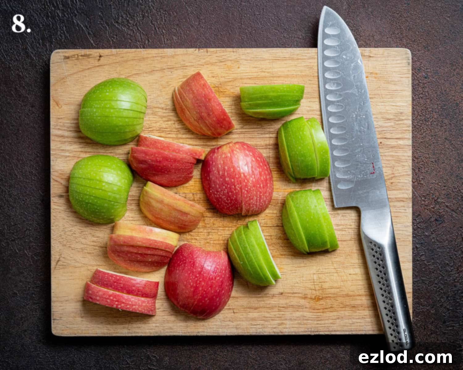 Elegant Vegan Apple Hazelnut Frangipane Tart 12 Step 8: Expertly cored and thinly sliced apples, kept together in their original shape, ready to adorn the tart.