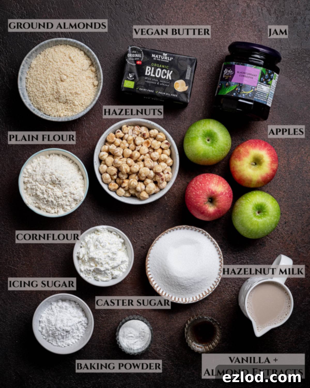 Elegant Vegan Apple Hazelnut Frangipane Tart 3 A clear, labelled photograph displaying all the essential ingredients required to bake a delicious vegan apple hazelnut frangipane tart.