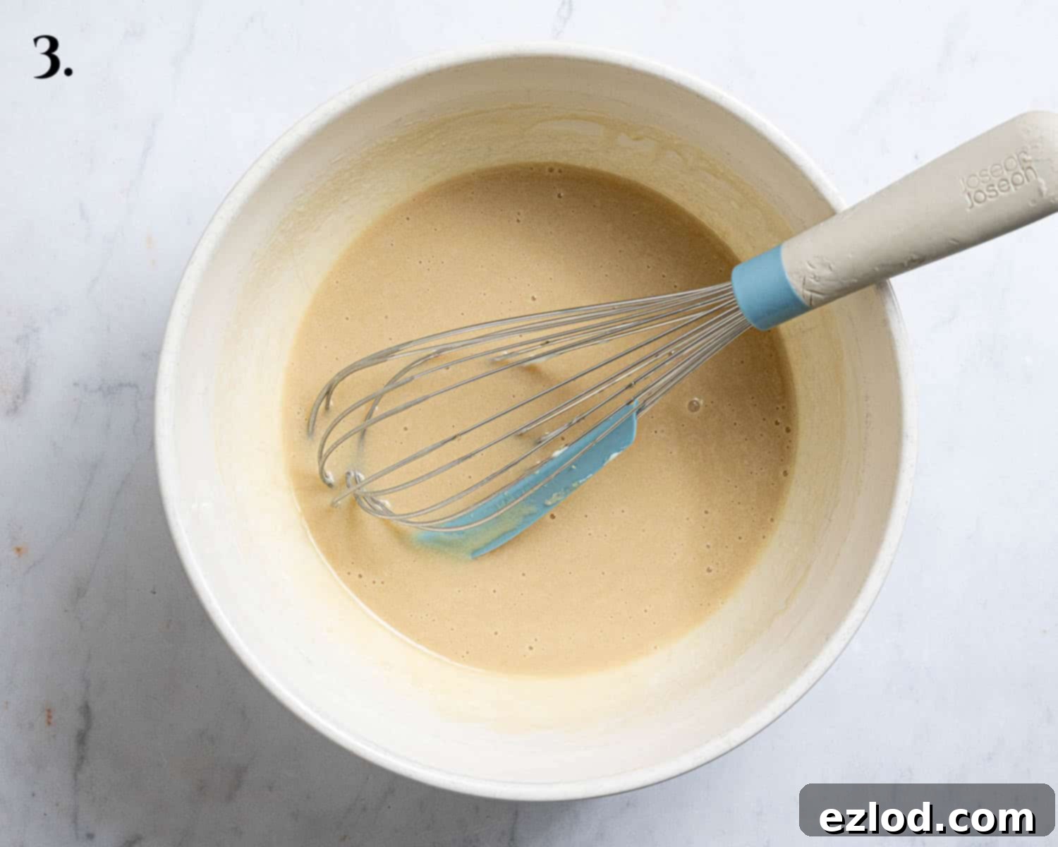 Spiced Vegan Apple Streusel Cake 7 Step 3, the wet ingredients for the cake batter mixed together in a bowl.