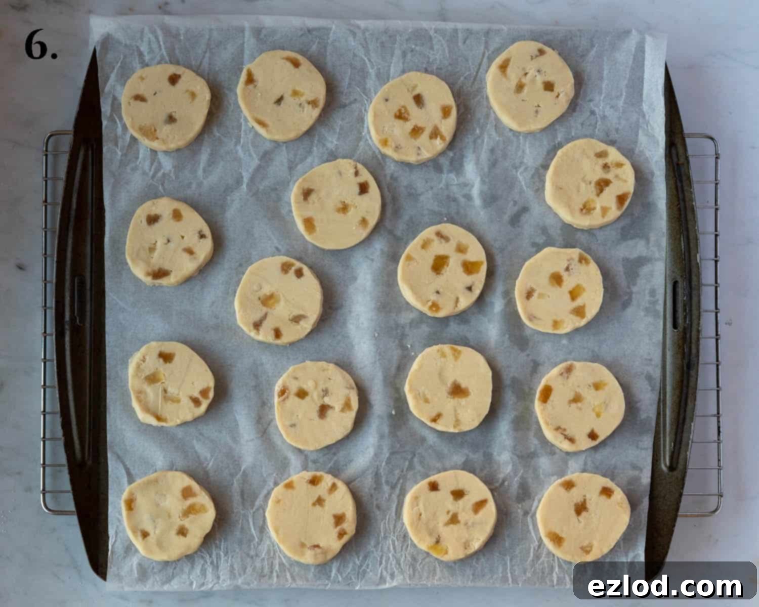 Buttery Ginger Shortbread 10 Step 6, the sliced dough on a baking sheet.