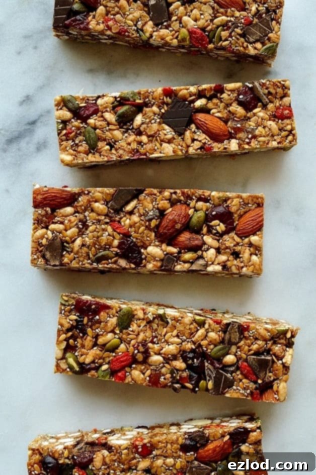Effortless Superfood Energy Bars 2 No-bake superfood granola bars - chewy, filling and super healthy granola bars packed full of seeds, nuts, dried fruit, oats and dark chocolate.