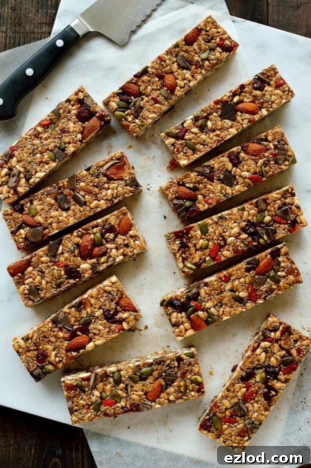 Effortless Superfood Energy Bars 7 No-bake chewy granola bars filled with superfood ingredients such as chia, pumpkin and linseeds, almonds, oats, cranberries, goji berries and dark chocolate