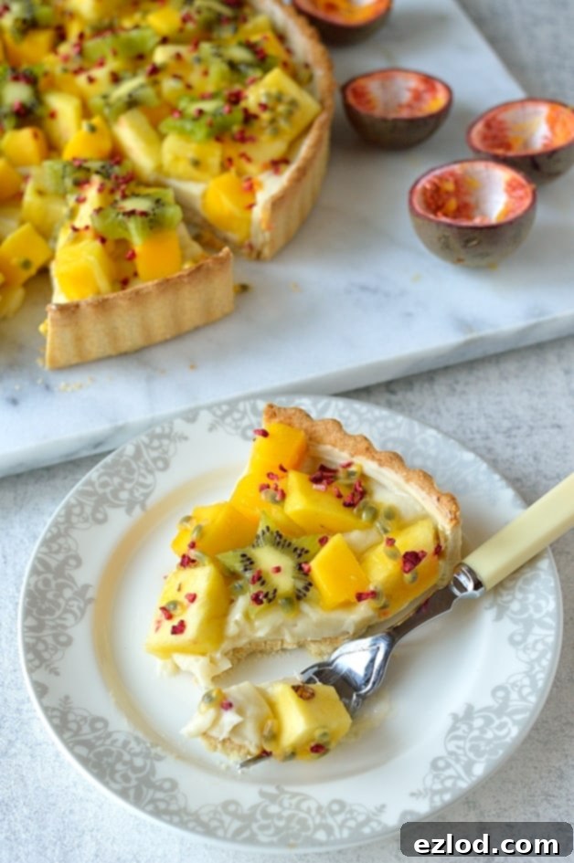 Vegan Tropical Fruit Coconut Tart 7 Tropical fruit coconut tart - crisp coconut pastry filled with coconut milk creme patissiere, mango, pineapple, kiwi & passion fruit