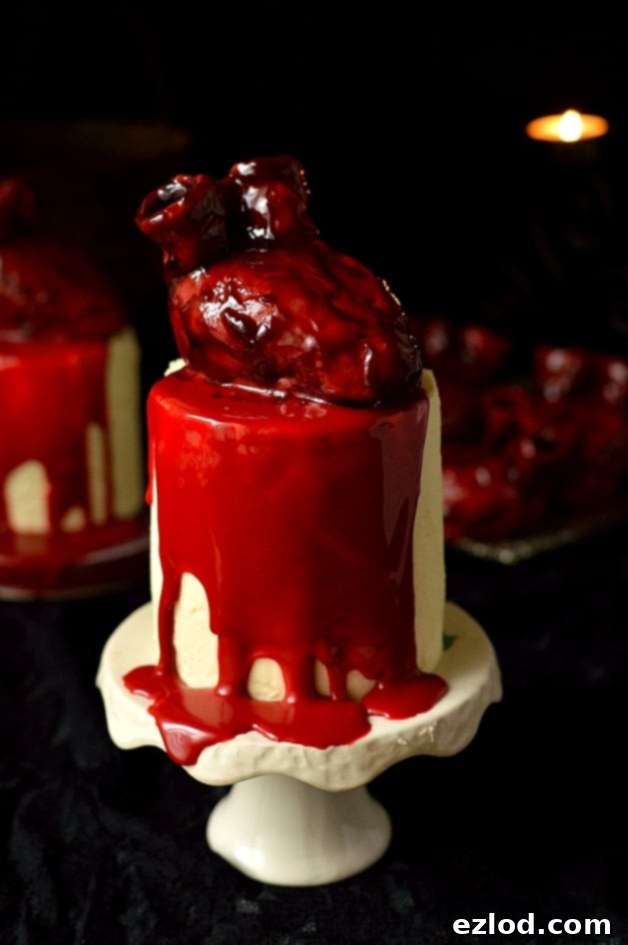 Haunted Heart Halloween Cupcakes 4 Halloween bleeding heart topped mini red velvet layer cakes