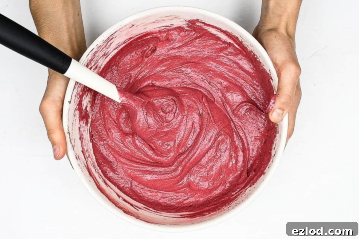 Haunted Heart Halloween Cupcakes 10 step 3 - colouring the batter
