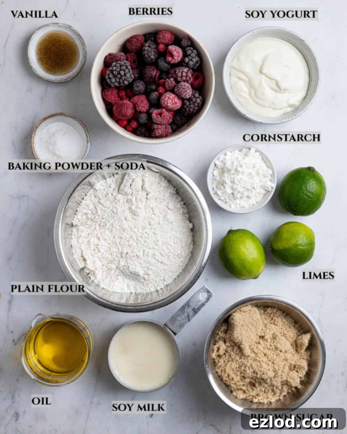 Vegan Berry Lime Bundt Cake 3 A clear, labelled photograph displaying all the essential ingredients meticulously laid out for baking a delicious berry lime bundt cake.