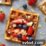 Decadent Chocolate Almond Waffles 5 chocolate chip almond waffles - fluffy waffles made with ground almonds and filled with chocolate chips; perfect for an indulgent breakfast or brunch.