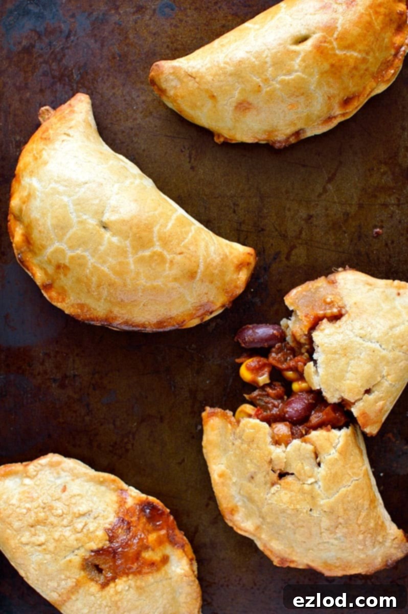 Effortless Veggie Chili and 5 Smart Leftover Dishes 11 Veggie chilli and cheese stuffed empanadas, golden and ready to eat, a creative and portable leftover option.