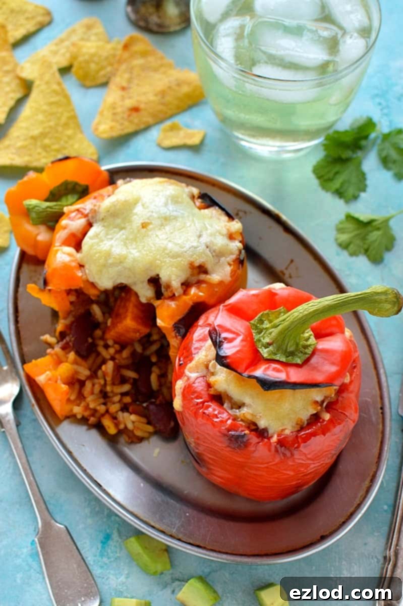 Effortless Veggie Chili and 5 Smart Leftover Dishes 9 Veggie chilli stuffed bell peppers with melted cheese, a healthy and creative way to use leftovers.