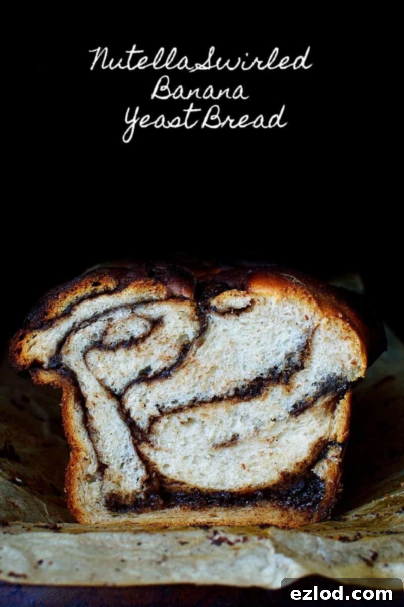 Marbled Nutella Banana Yeast Bread 2 Close-up of Nutella Swirled Banana Yeast Bread showing the beautiful swirl pattern and golden crust.
