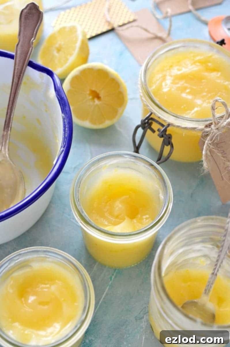 Zesty Plant-Based Lemon Cream 4 A selection of bowls filled with golden vegan lemon curd, highlighting its smooth, rich consistency and bright yellow color. This easy, egg-free, and dairy-free spread is intensely lemony and comes together in minutes.
