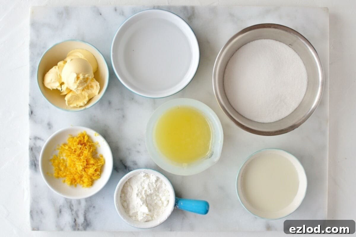 Zesty Plant-Based Lemon Cream 6 All the fresh ingredients laid out for making vegan lemon curd: lemons, sugar, cornflour, water, almond milk, and vegan butter. Emphasizing fresh, simple ingredients for an egg-free, dairy-free lemon spread.