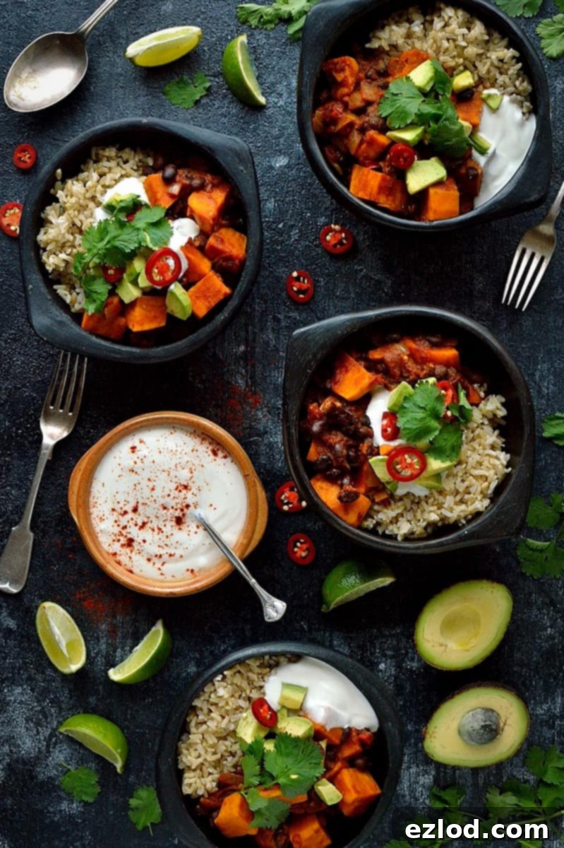 Hearty Vegan Sweet Potato Black Bean Chili 10 A vibrant bowl of vegan sweet potato and black bean chilli, showcasing its healthy, hearty, filling, and easy-to-make qualities. Served with various fresh toppings.