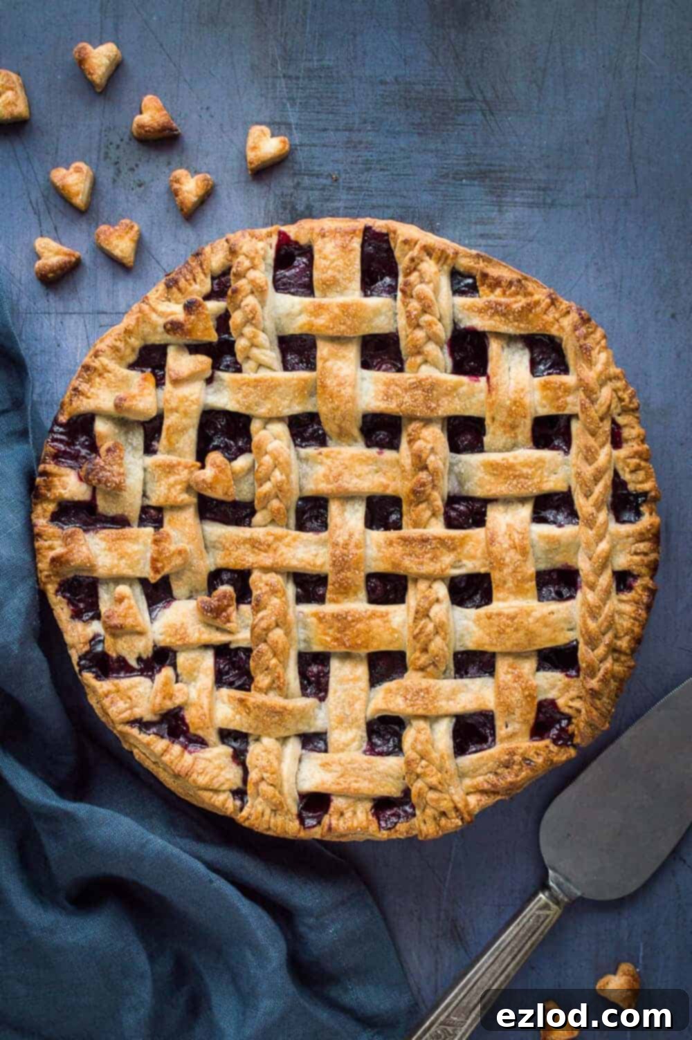 Vegan Blueberry Pie with a Flaky Coconut Oil Crust 13 Baked vegan blueberry pie with golden coconut oil pastry lattice, braids, and hearts