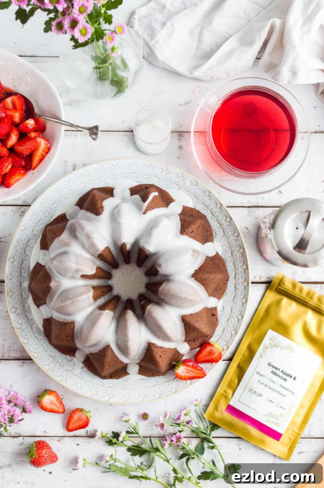 Vegan Ginger Bundt with Zesty Lime Drizzle and Sweet Strawberries 5 Vegan ginger bundt cake with lime glaze and macerated strawberries paired with JING Green Apple and Hibiscus herbal tea.