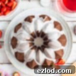 Vegan Ginger Bundt with Zesty Lime Drizzle and Sweet Strawberries 9 Vegan ginger bundt cake with lime glaze and macerated strawberries – a moist, spicy, easy to make cake served with juicy strawberries; perfect for afternoon tea! #gingerbread #vegan #vegancake #veganbaking #dairyfree #eggfree #bundtcake