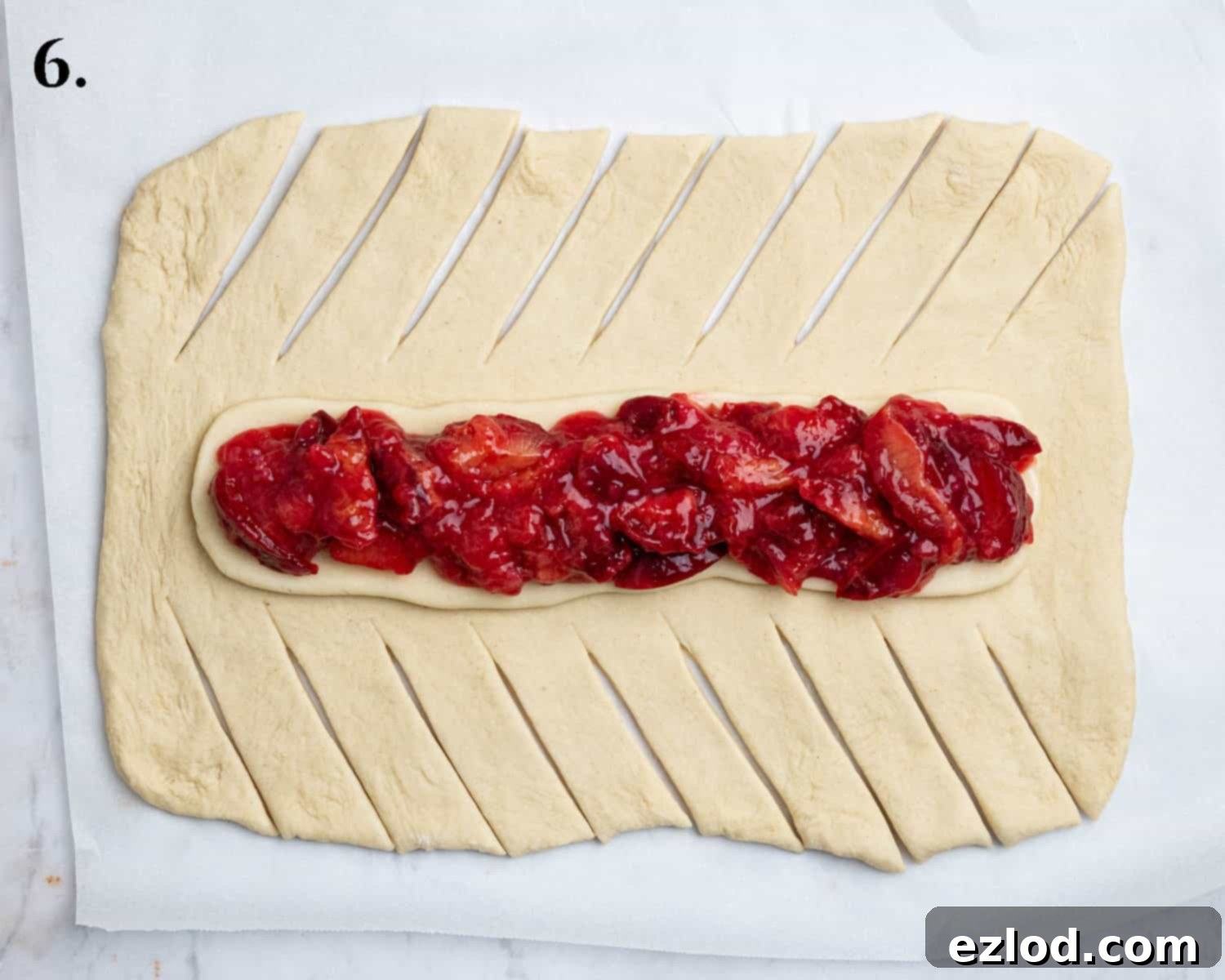 Vegan Plum Marzipan Delight 10 Step 6, the dough cut into strips.