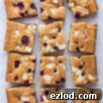 Luscious Vegan Raspberry White Chocolate Almond Sheet Cake 4 Raspberry, white chocolate and almond sheet cake - this amazing eggless, dairy free and vegan traybake cake is wonderfully soft and moist and full of fresh raspberries and white chocolate chunks. #vegan #vegancake #veganbaking