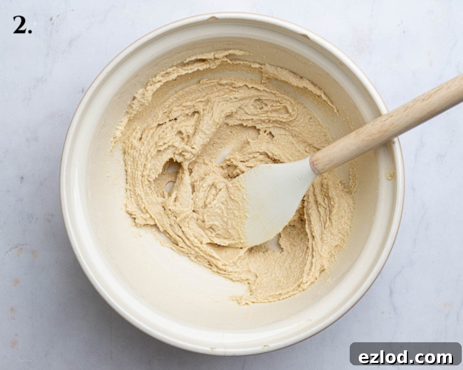 Step 2: Creaming vegan butter and sugars until smooth and light.