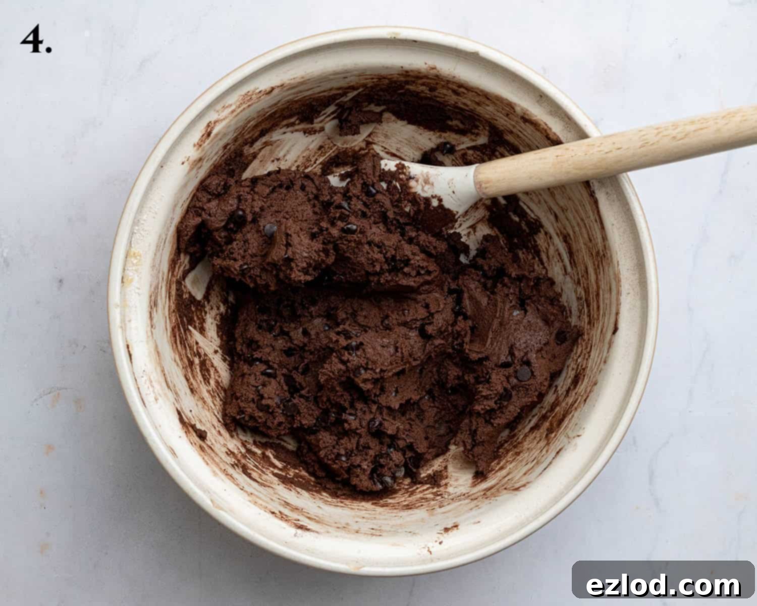 Step 4: The fully mixed cookie dough with chocolate chunks, ready for chilling.