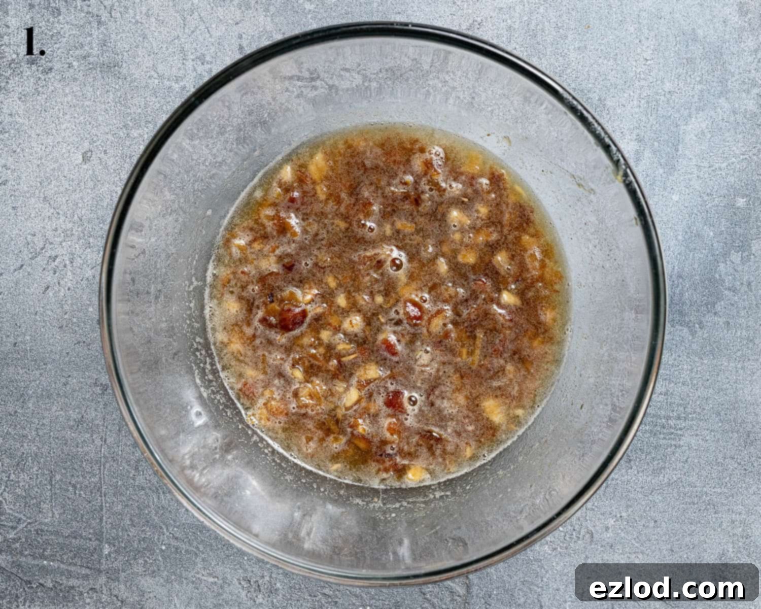 Spiced Pumpkin Sticky Toffee Pudding 5 Step 1: Chopped dates soaking in a bowl with bicarbonate of soda and boiling water, preparing them for blending.